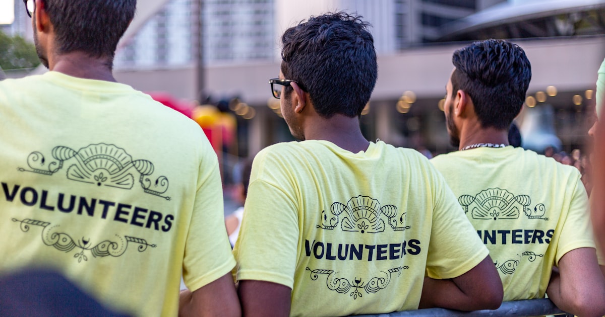 Volunteers in matching shirts at a community event